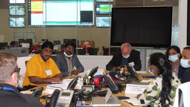 Photo showing visitors from India's Telangana region meeting with EMD staff in a conference room off the Emergency Operations Center of LA City.