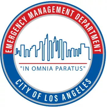 Logo of EMD; red and blue ring surrounding a white skyline of a city, with the motto "in omnia paratus" - or "prepared for all things".